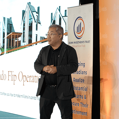 Simon Yan speaking at the Real Estate Investor's Summit